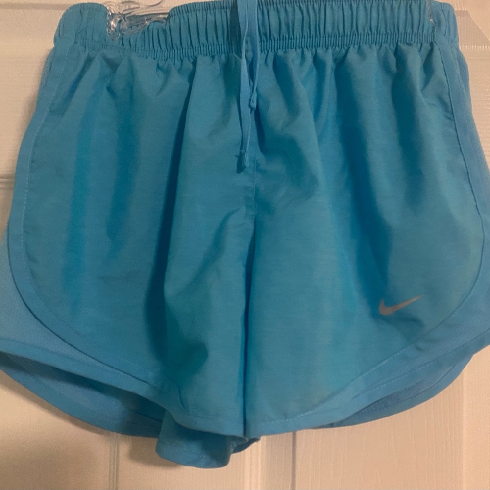 bright blue nike running shorts